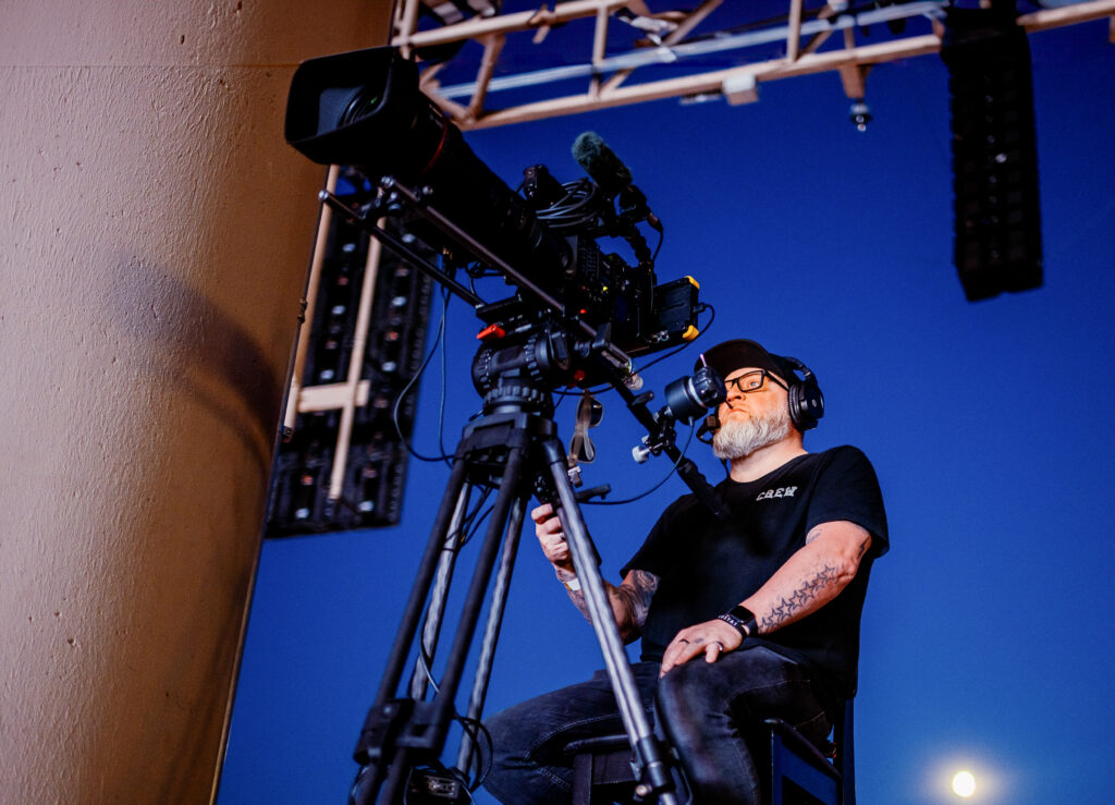 Camera operator providing IMAG at a large-scale concert/event