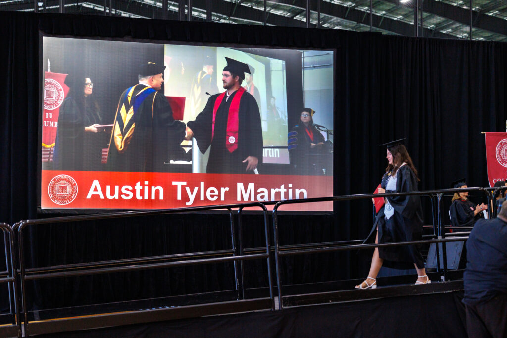 Students graduating and walking the stage